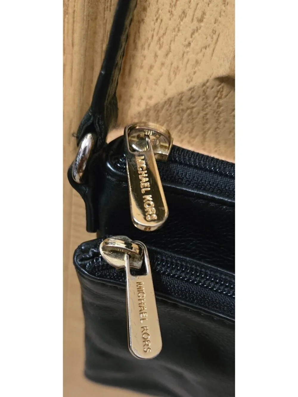 Michael Kors Black Leather Crossbody Bag with Gold Logo and Adjustable Strap